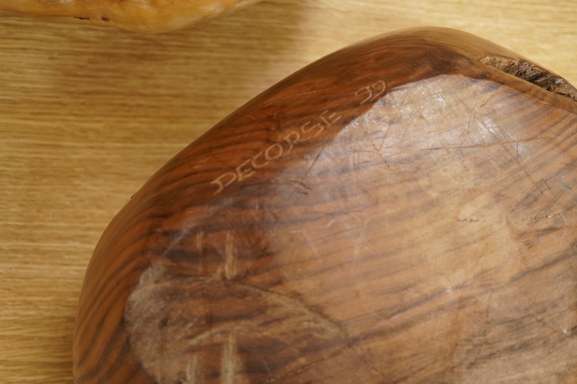 Pierre Decorse (b.1953), a naturalistically modelled wooden sculpture with inset stone, 37cm wide